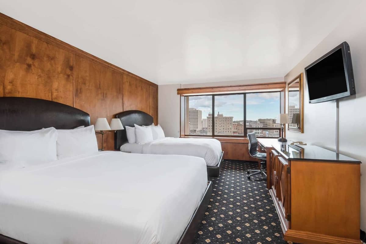Hypo-allergenic bedding, pillow-top beds, in-room safe, desk