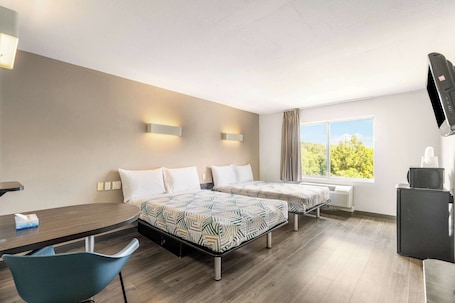 Minibar, desk, blackout drapes, iron/ironing board