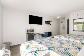 Minibar, desk, blackout drapes, iron/ironing board