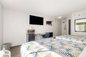 Minibar, desk, blackout drapes, iron/ironing board