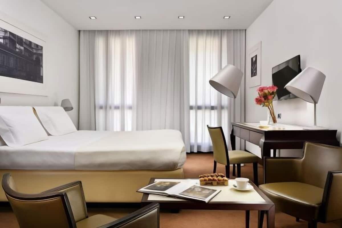 Down comforters, minibar, in-room safe, desk