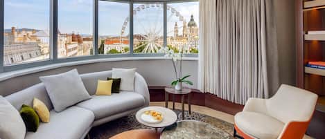 Premium bedding, down comforters, pillowtop beds, minibar