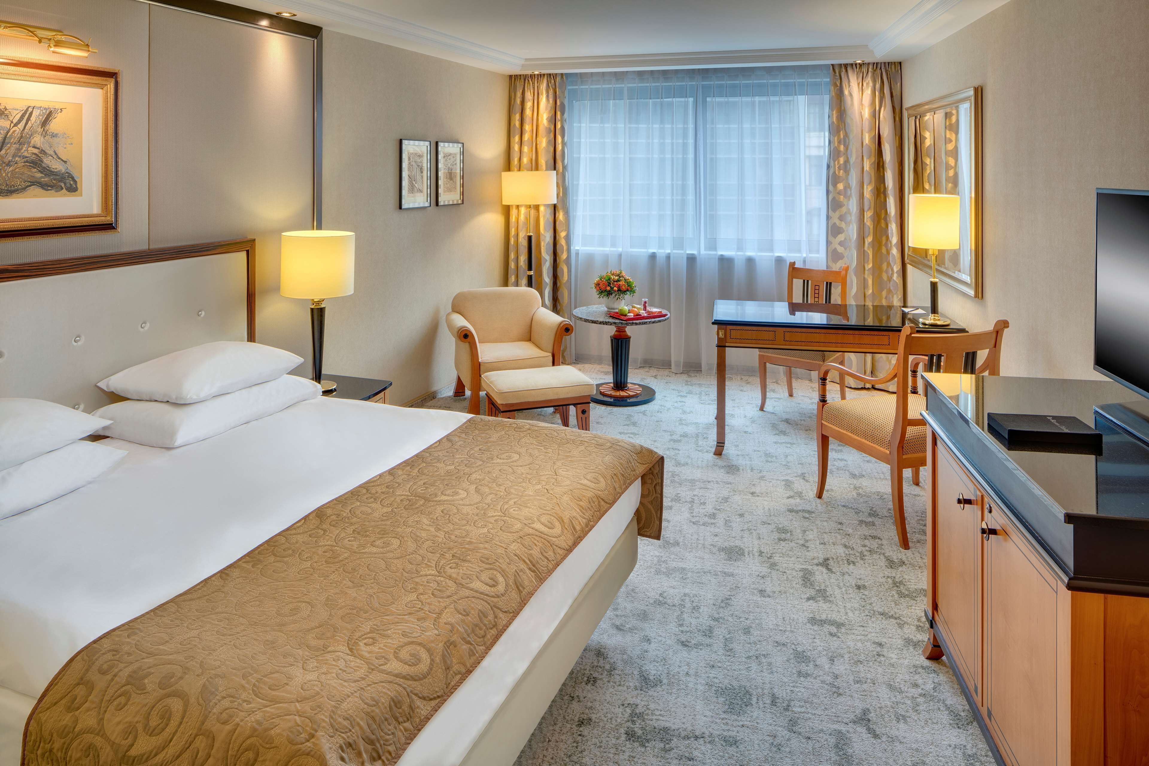 Premium bedding, down comforters, pillowtop beds, minibar