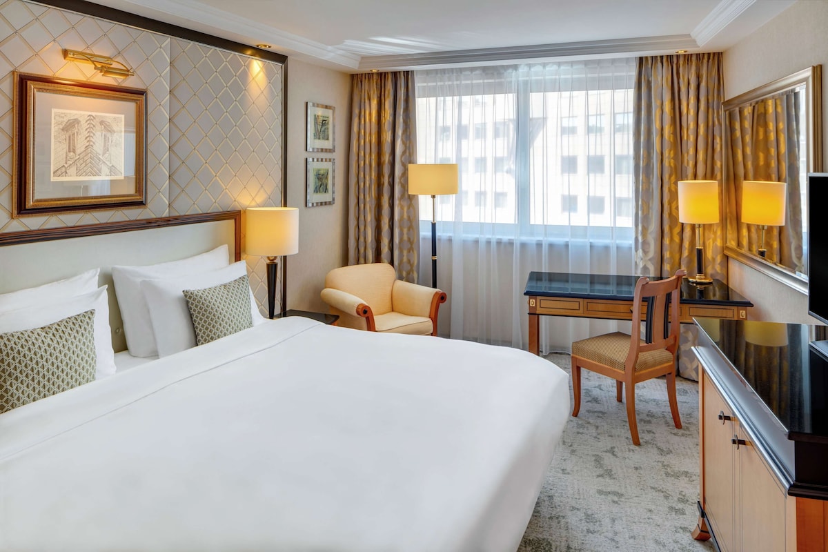Premium bedding, down comforters, pillowtop beds, minibar