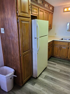 Apartment, 1 King Bed, Non Smoking | Private kitchen | Coffee/tea maker