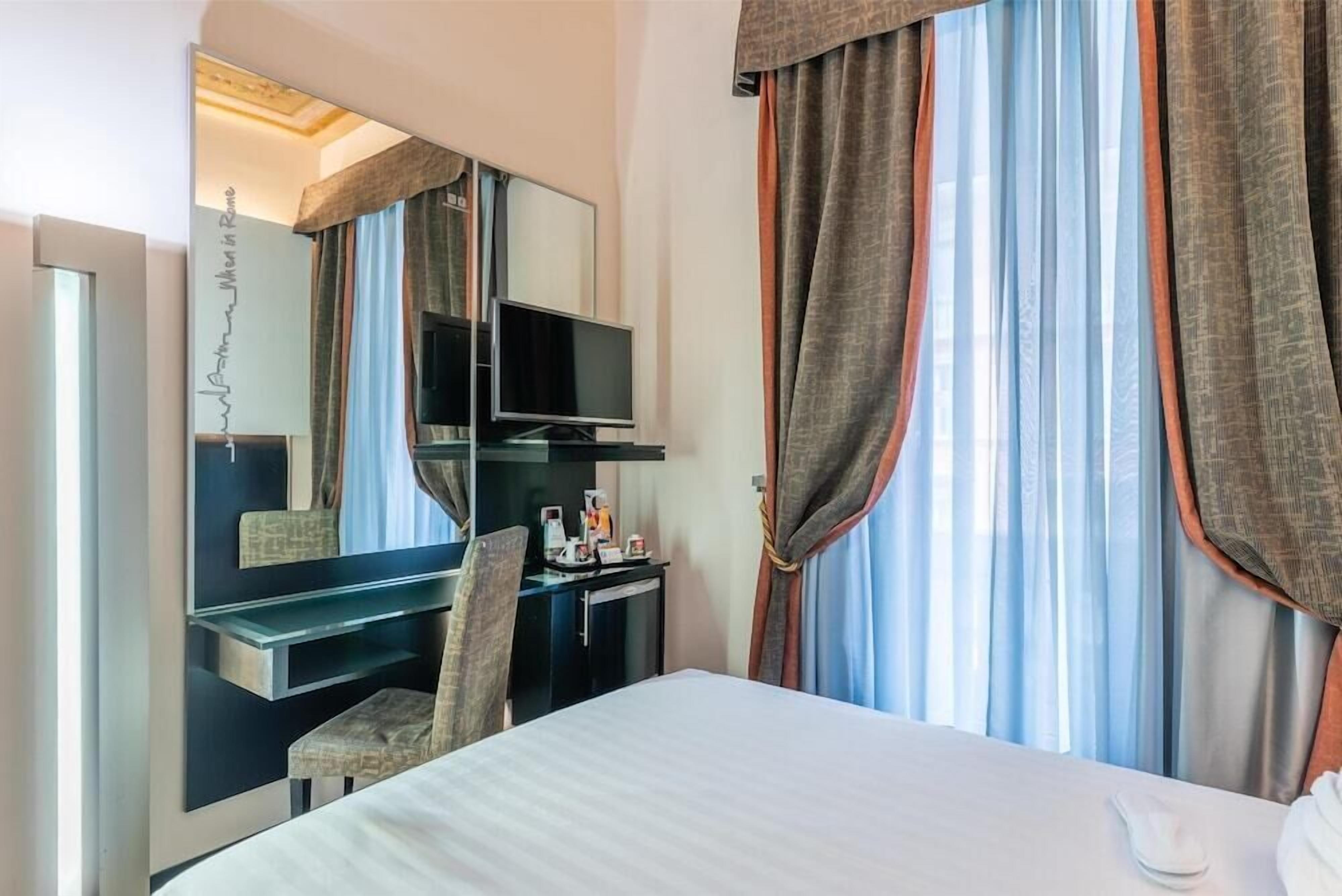 Premium bedding, memory-foam beds, minibar, in-room safe