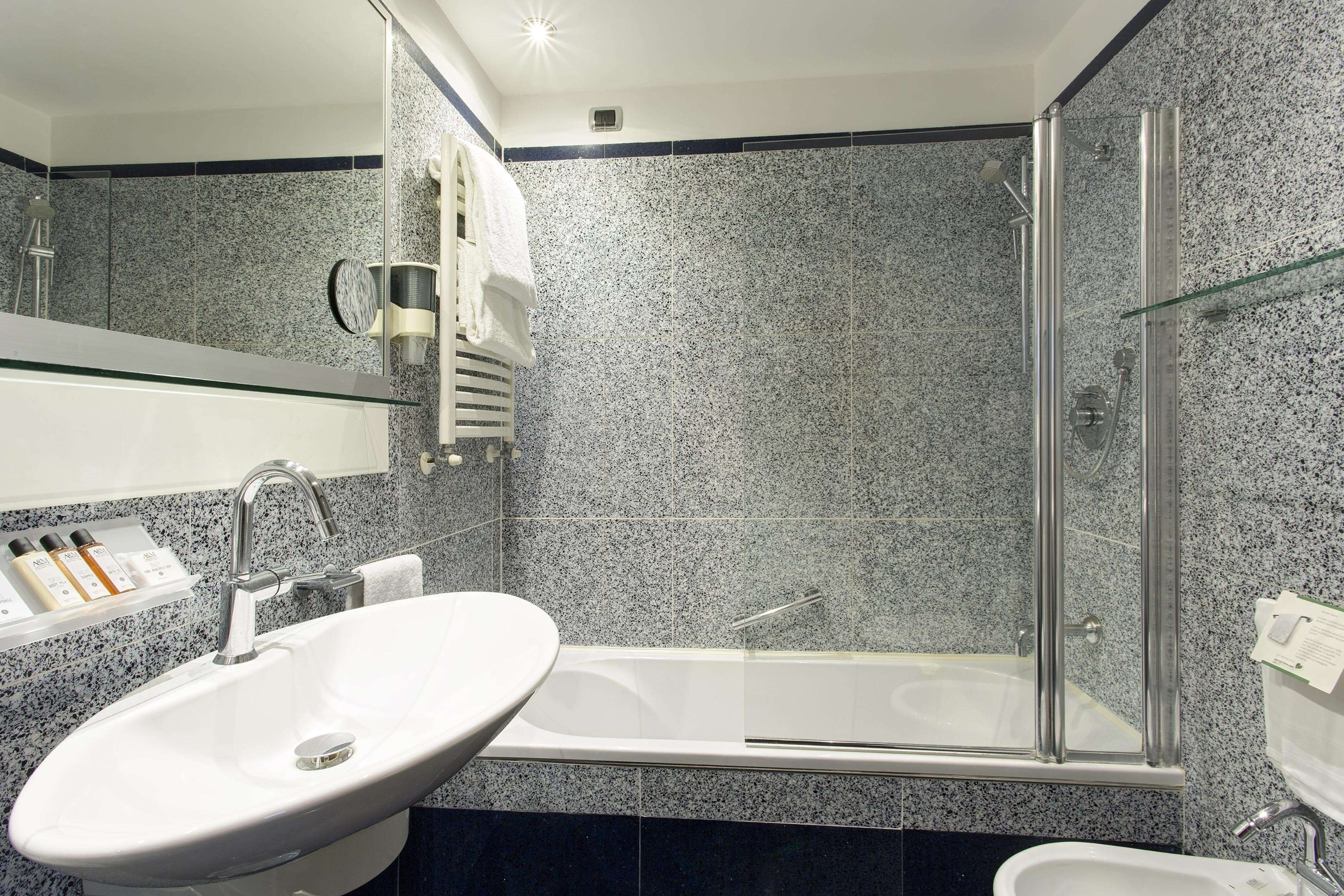 shower, deep-soaking bathtub, hair dryer, bidet