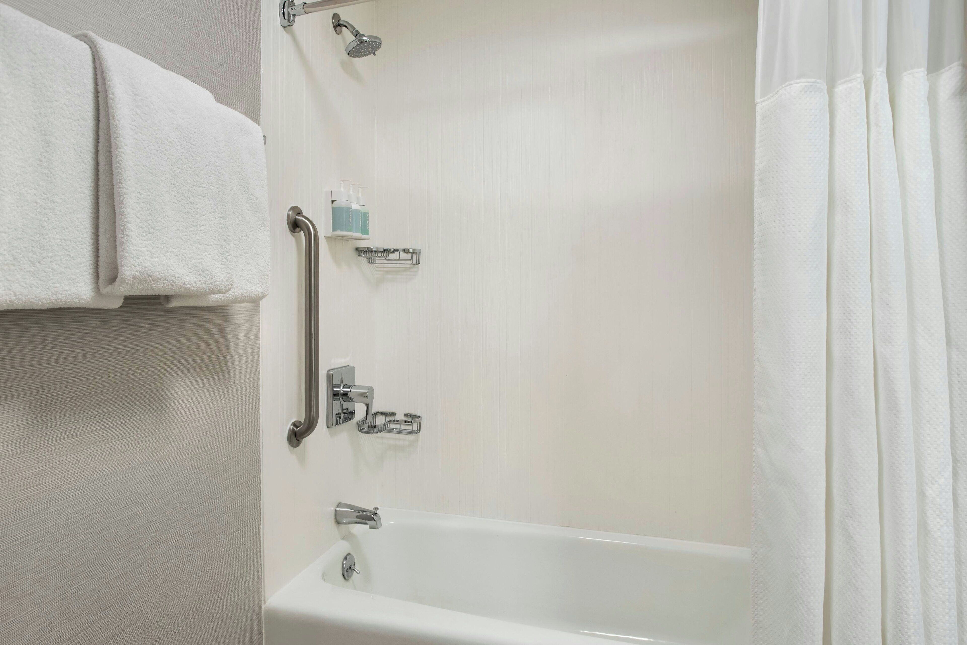 combined shower/bathtub, free toiletries, hair dryer, towels