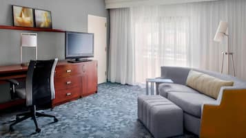 Premium bedding, desk, laptop workspace, iron/ironing board