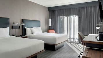 Premium bedding, desk, laptop workspace, iron/ironing board