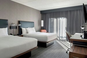 Premium bedding, desk, laptop workspace, iron/ironing board