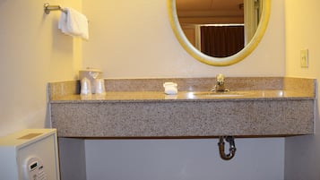 Combined shower/bathtub, hair dryer, towels