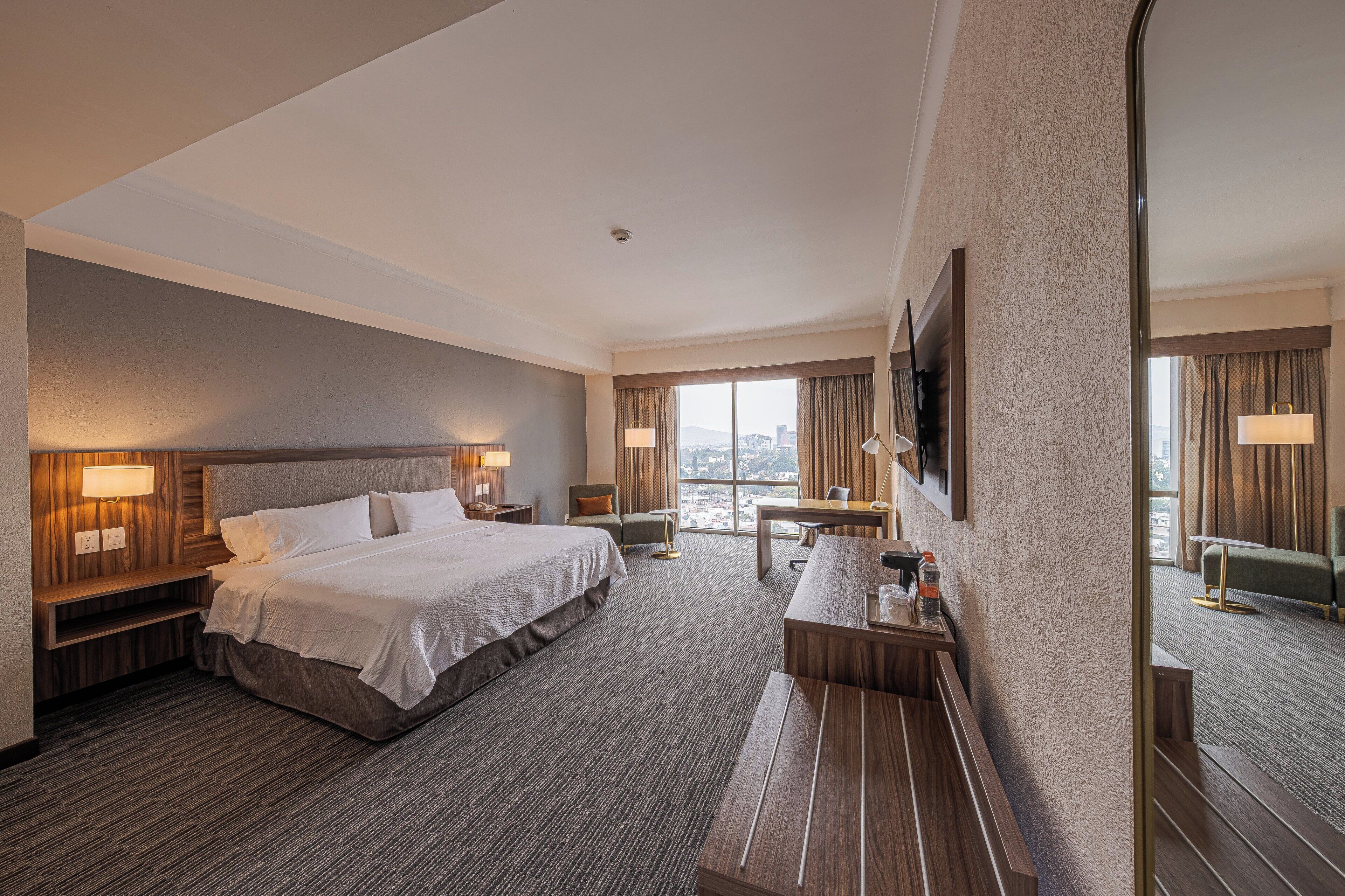 In-room safe, desk, blackout curtains, iron/ironing board