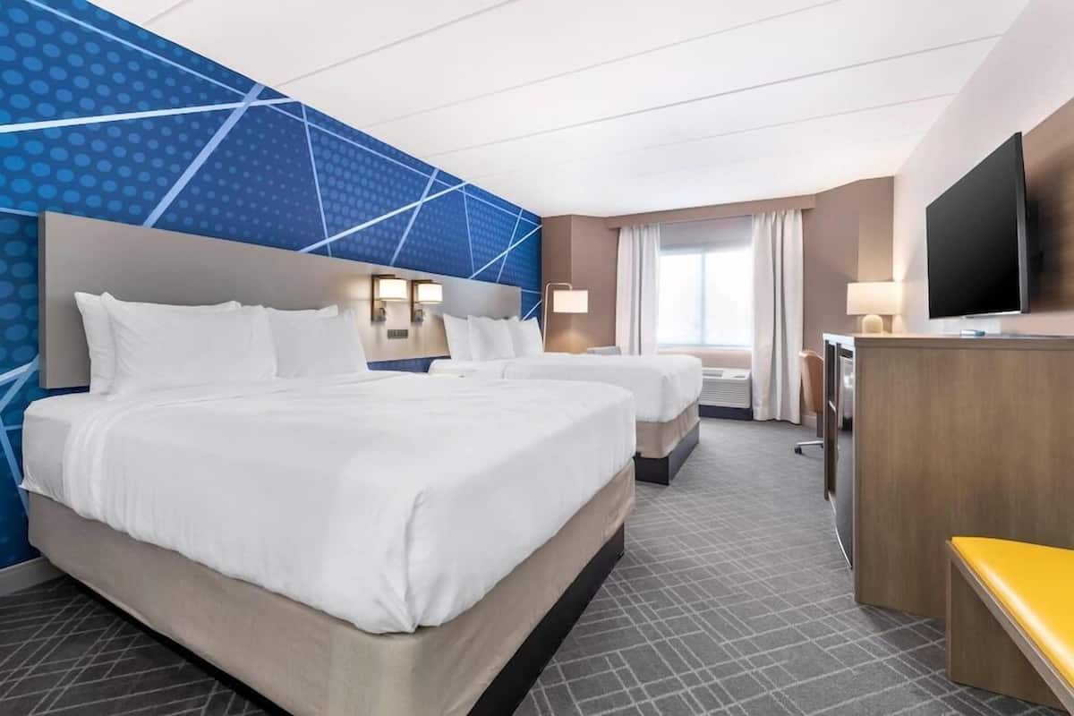 Pillow-top beds, desk, laptop workspace, blackout curtains