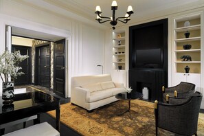 Suite, 1 Bedroom | Living room | 32-inch LCD TV with satellite channels, TV, pay movies