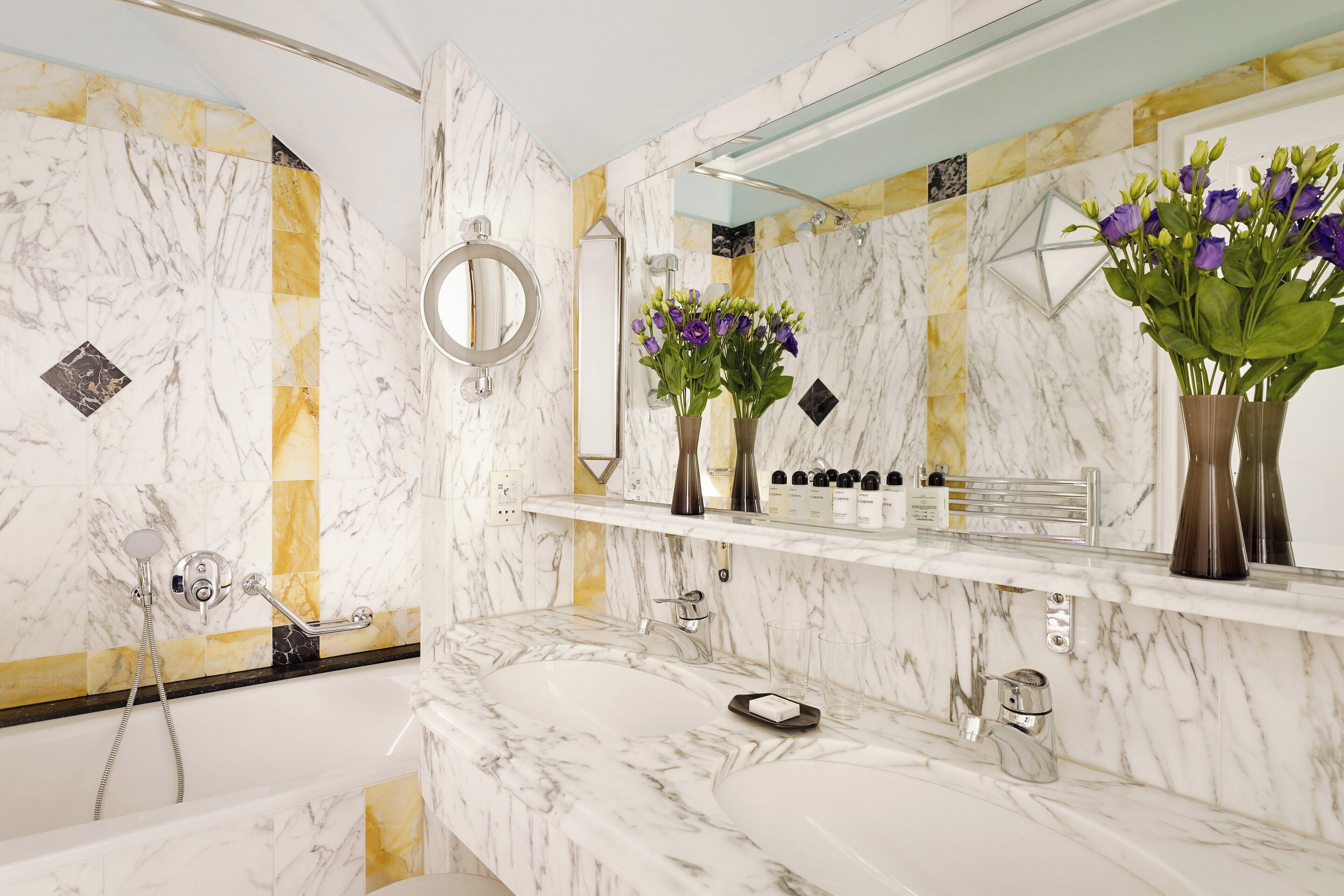 suite, 1 king bed, non smoking, balcony (junior suite, large balcony) | bathroom | designer toiletries, hair dryer, bathrobes, slippers