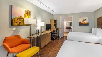 Premium bedding, down comforters, pillowtop beds, in-room safe