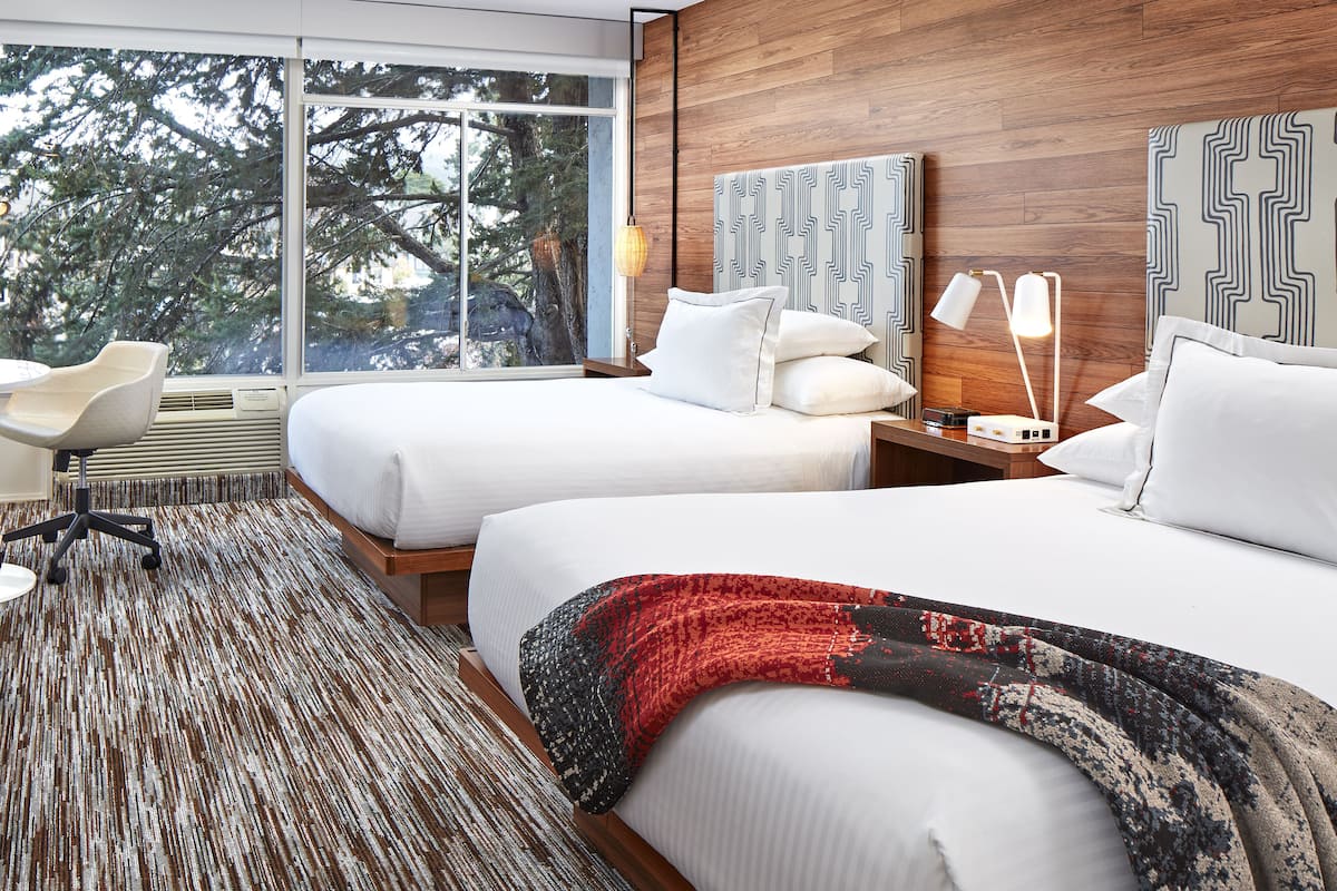 deluxe room, 2 queen beds | hypo-allergenic bedding, in-room safe, blackout curtains