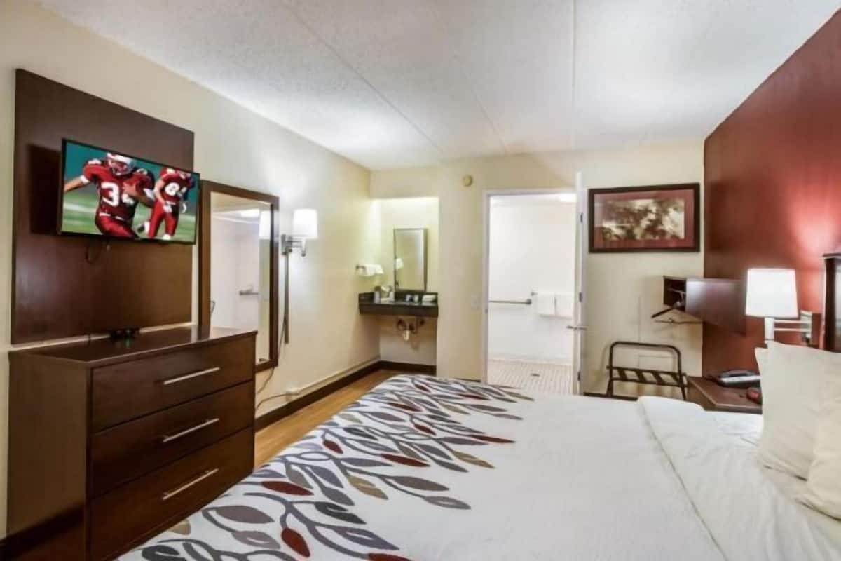 Desk, laptop workspace, blackout curtains, free WiFi