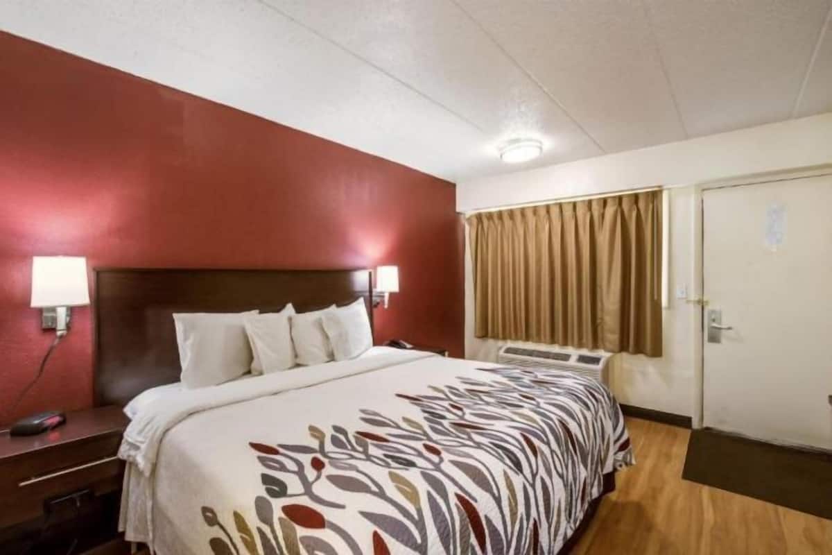 Desk, laptop workspace, blackout curtains, free WiFi