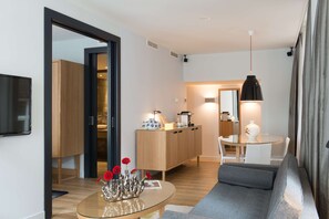 Suite, 1 King Bed, City View | Living area | 42-inch TV with digital channels - Swissôtel Amsterdam (Amsterdam)