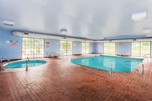 Indoor pool, open 2:00 PM to 10:00 PM, pool loungers