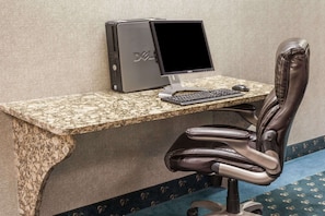 Work in comfort with a dedicated desk and ergonomic chair.