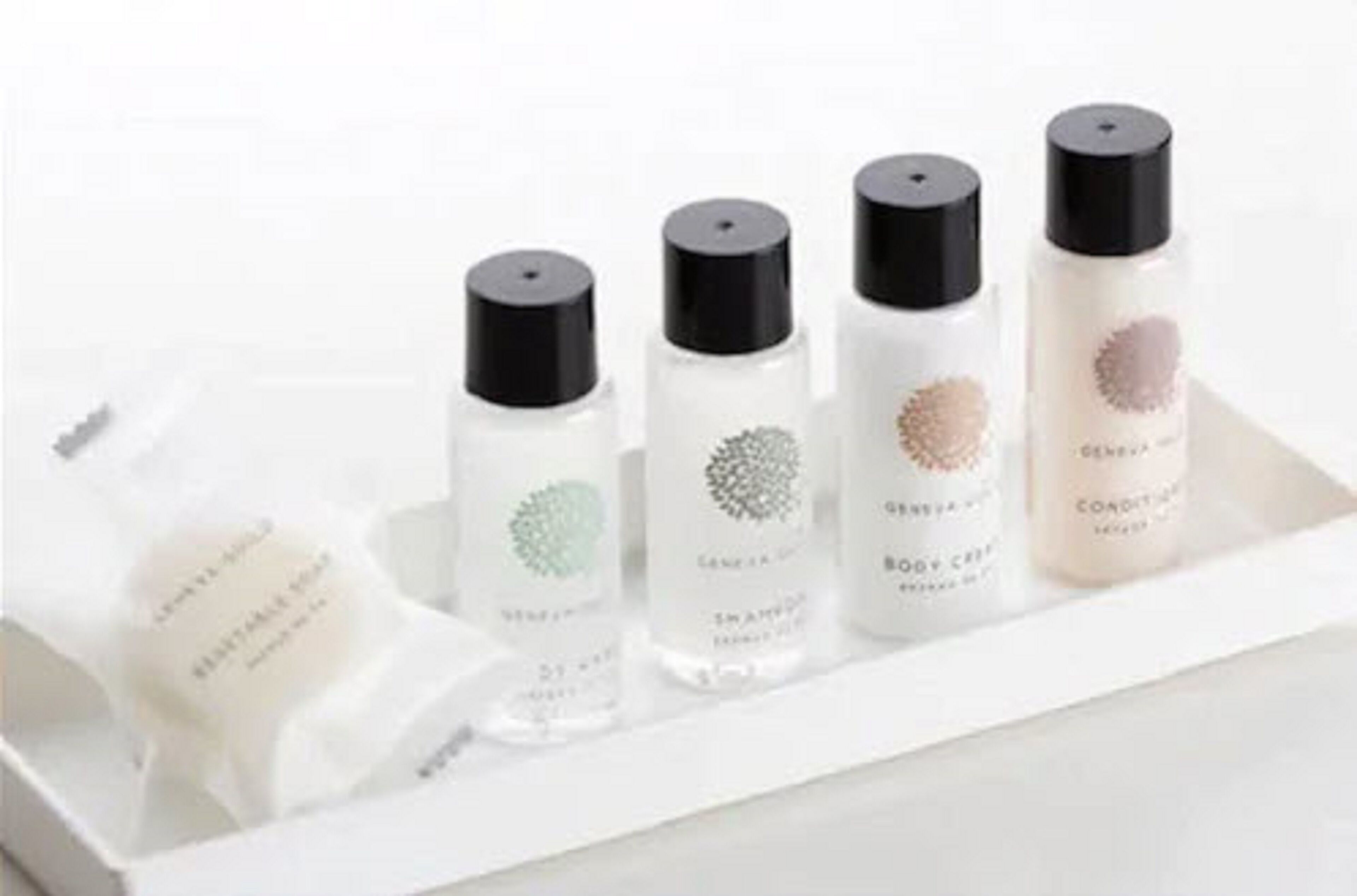 combined shower/bathtub, designer toiletries, hair dryer, slippers