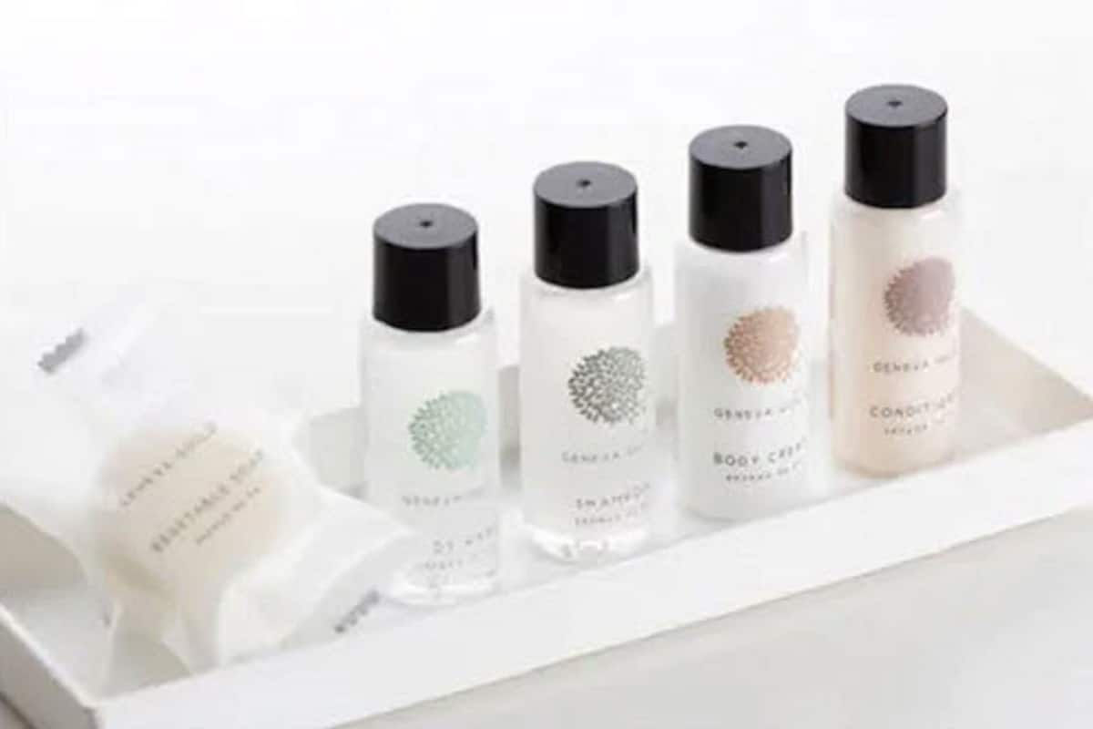 combined shower/bathtub, designer toiletries, hair dryer, slippers