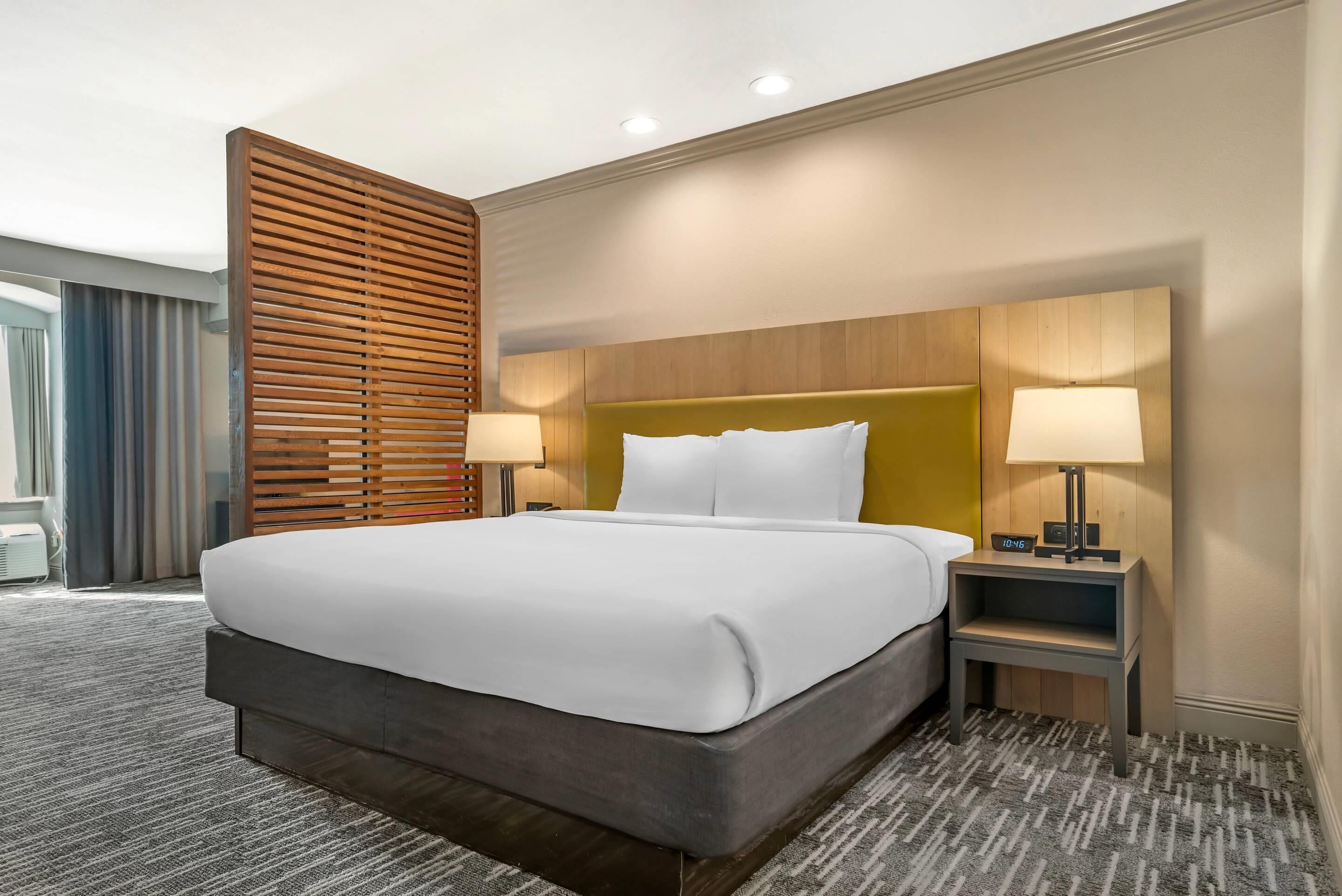Suite, 1 King Bed, Non Smoking (Exterior Corridor) | Premium bedding, in-room safe, desk, laptop workspace