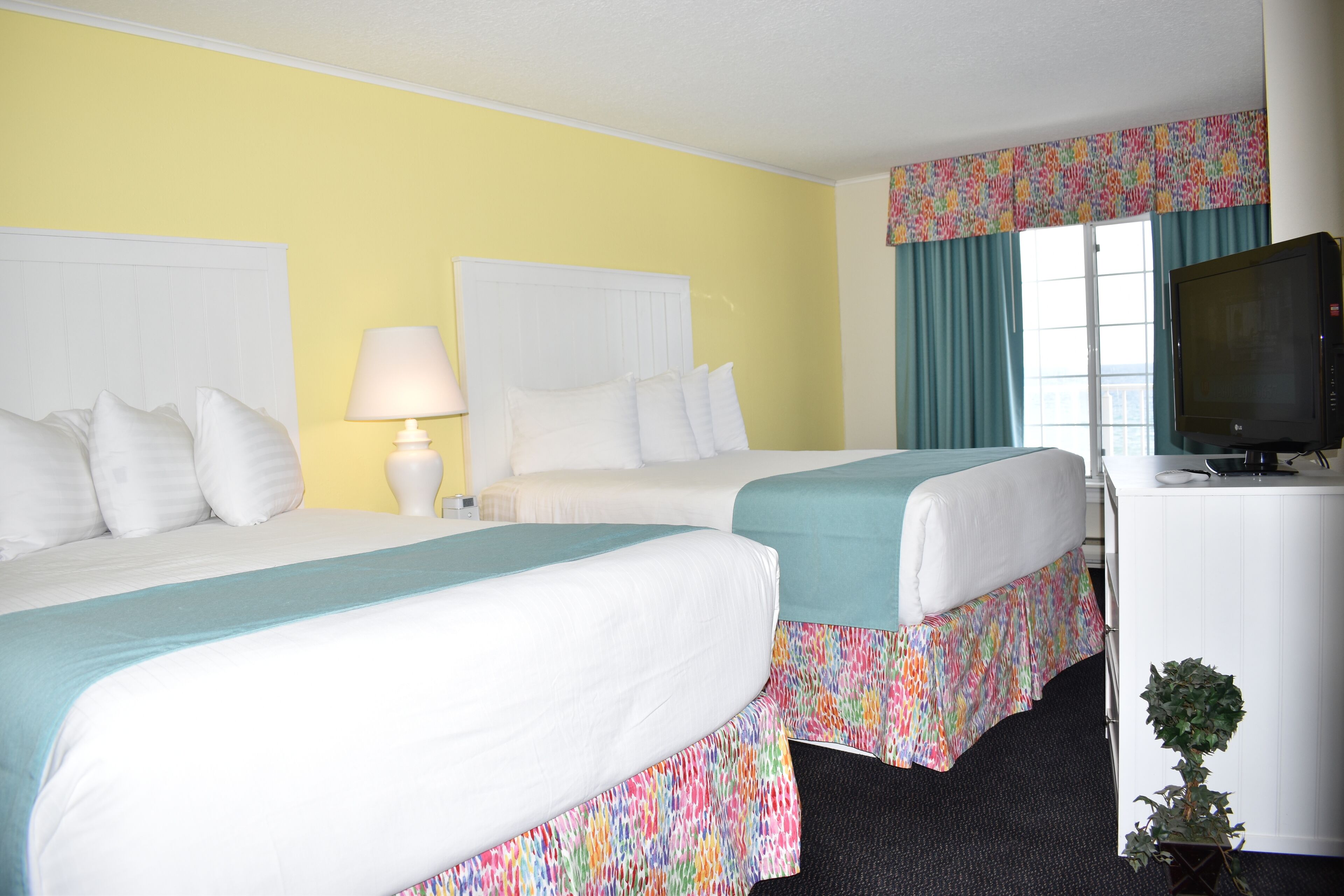 deluxe suite, 1 bedroom, balcony, lake view | blackout curtains, iron/ironing board, free wifi, bed sheets