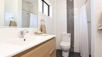 Shower, eco-friendly toiletries, hair dryer, towels