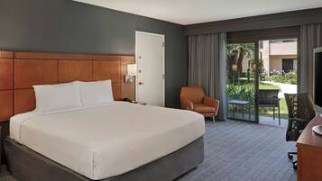 Desk, laptop workspace, blackout drapes, iron/ironing board