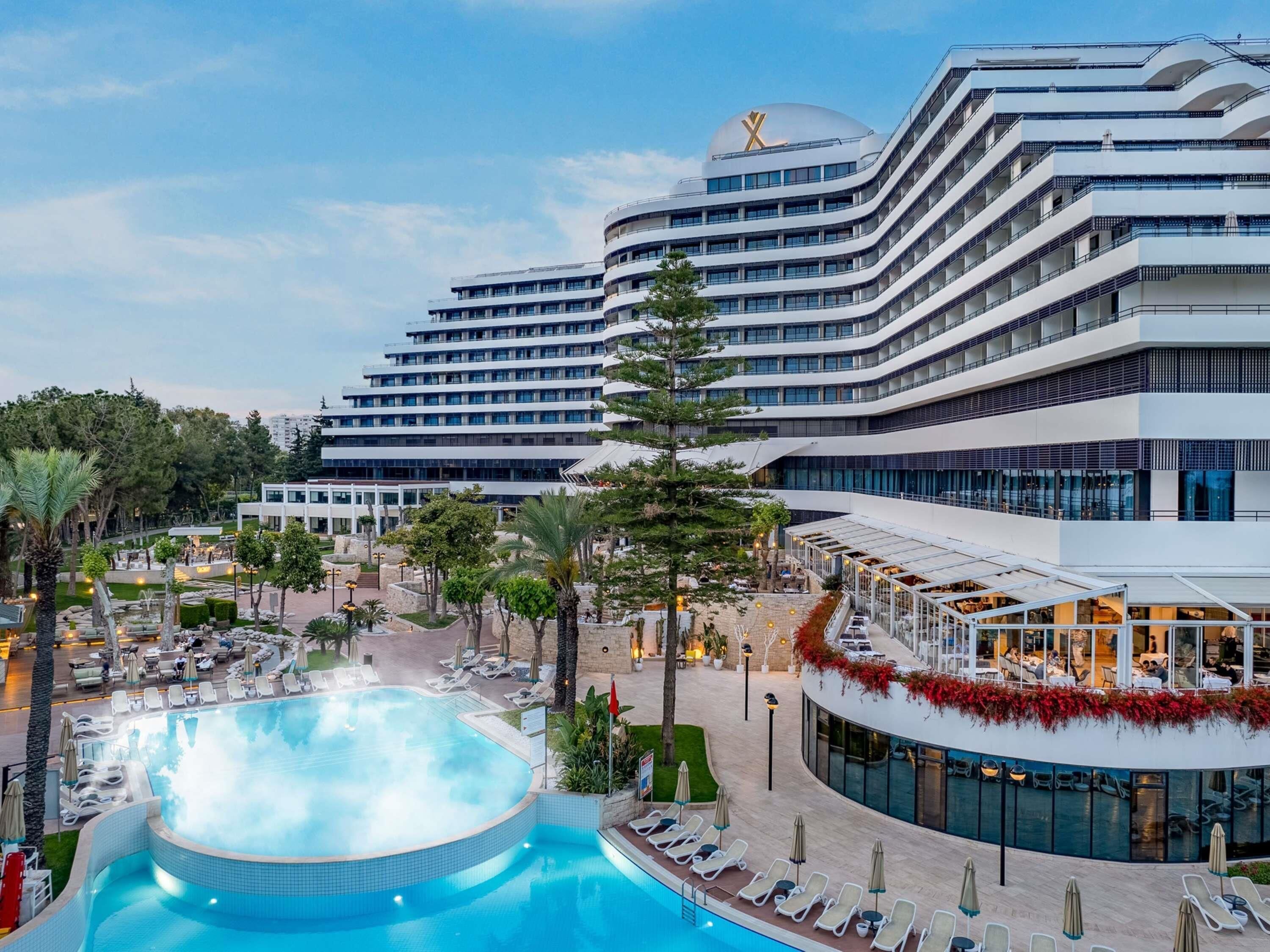 2 outdoor pools, pool umbrellas, sun loungers