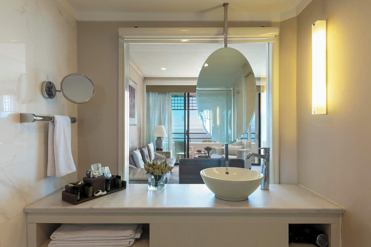 junior suite, 1 king bed, sea view | bathroom | shower, rainfall showerhead, eco-friendly toiletries, hair dryer