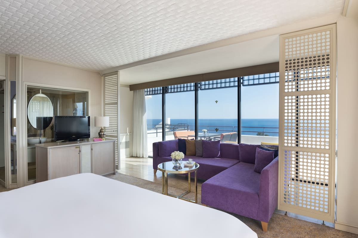 deluxe terrace suite, sea view, king bed, two sofas | view from room