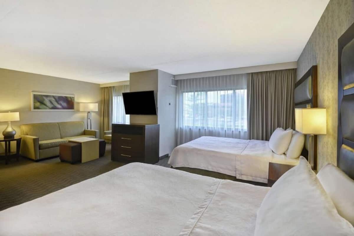 Premium bedding, down comforters, in-room safe, desk