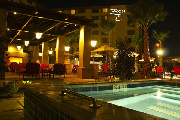 Outdoor pool, open 8:00 AM to 10:00 PM, pool umbrellas, sun loungers
