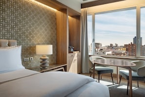 Premium bedding, memory foam beds, minibar, in-room safe