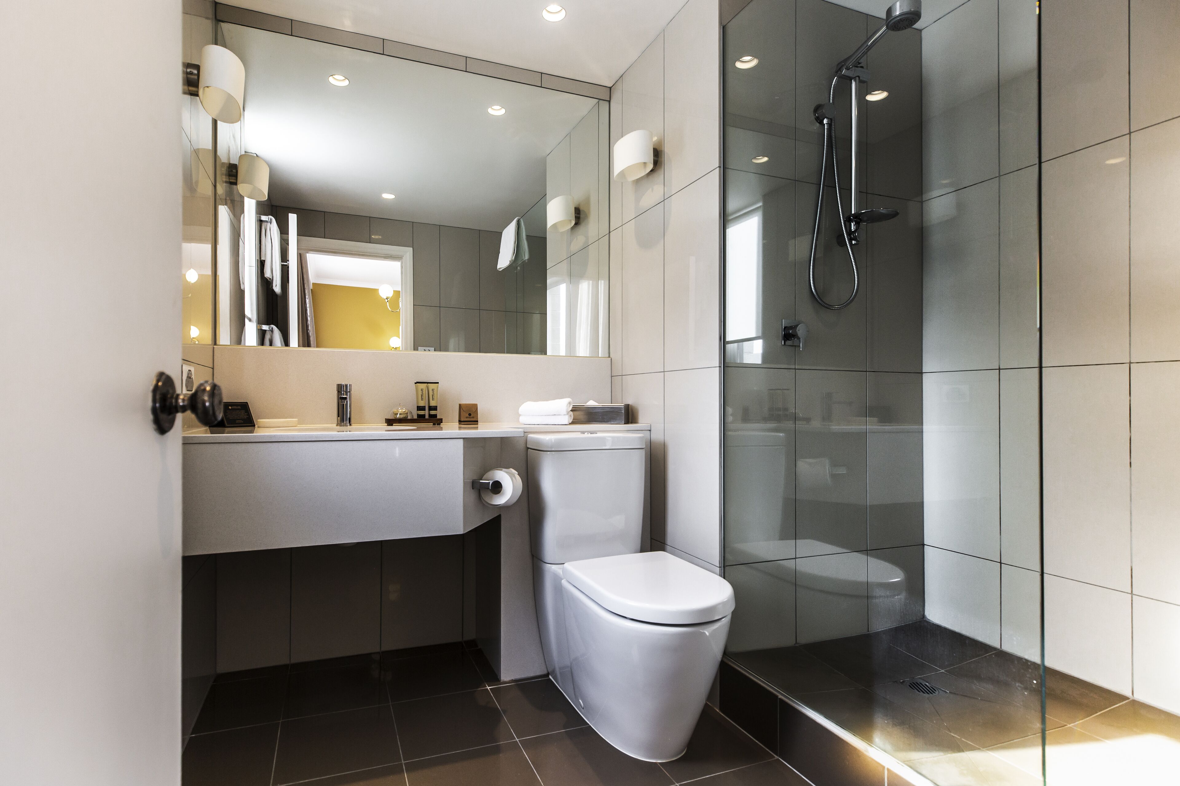 shower, rainfall showerhead, designer toiletries, hair dryer