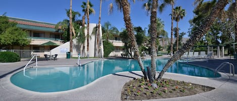 2 outdoor pools, open 7:00 AM to 10:00 PM, pool loungers