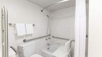 Bathtub, hair dryer, towels