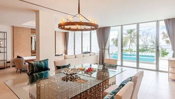 2Bedroom Pool Suite Beach Front | Living area | 40-inch flat-screen TV with satellite channels