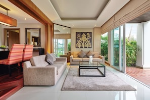 Two Bedroom Island Suite | Living area | 40-inch flat-screen TV with satellite channels - Angsana Laguna Phuket (Choeng Thale)