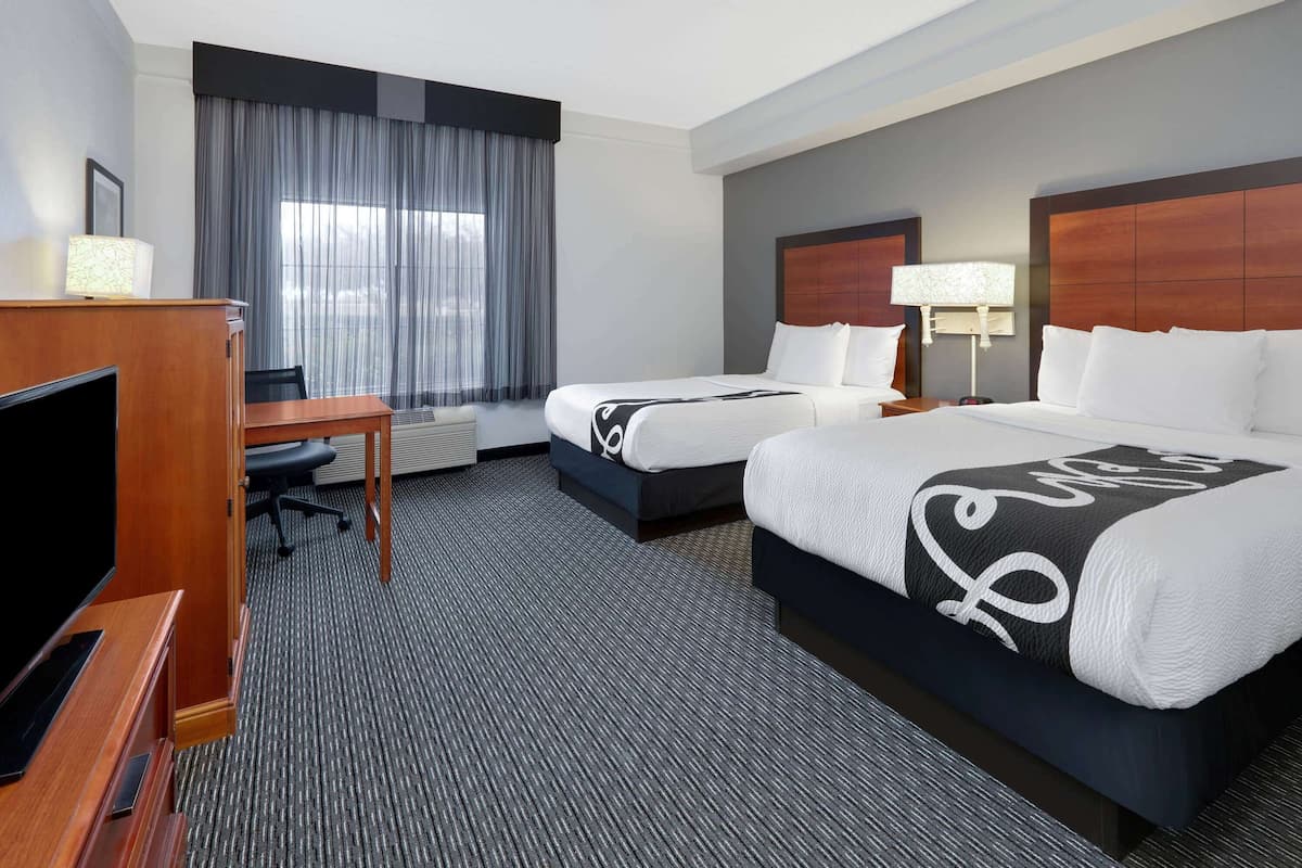 Deluxe Room, 2 Double Beds, Non Smoking | Premium bedding, desk, iron/ironing board, free cribs/infant beds