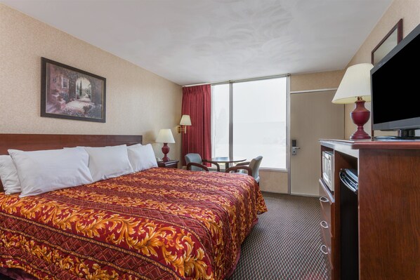 Desk, laptop workspace, iron/ironing board, free cots/infant beds