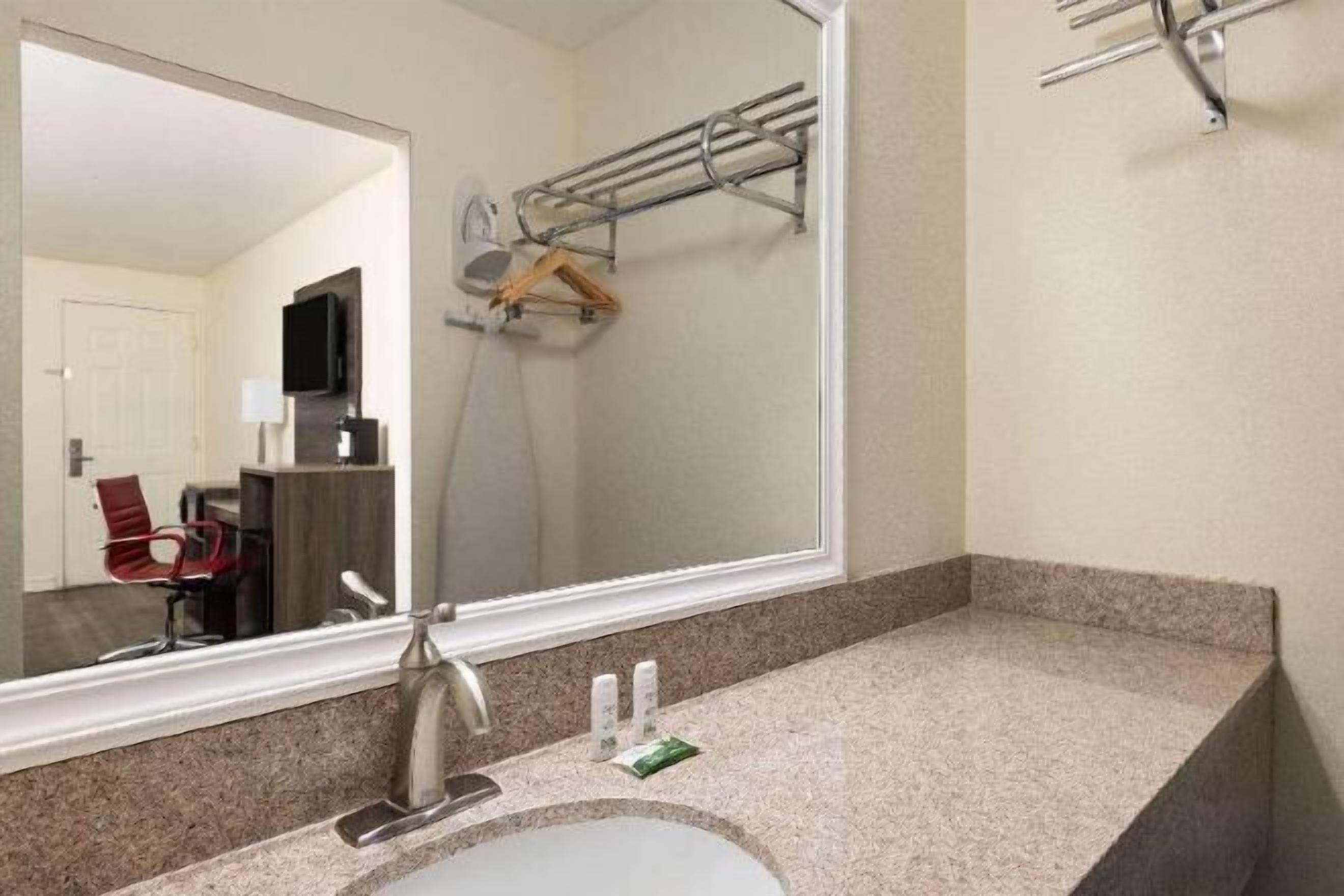 Deep-soaking bathtub, eco-friendly toiletries, hair dryer, towels