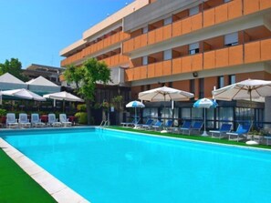 Outdoor pool, pool umbrellas, pool loungers