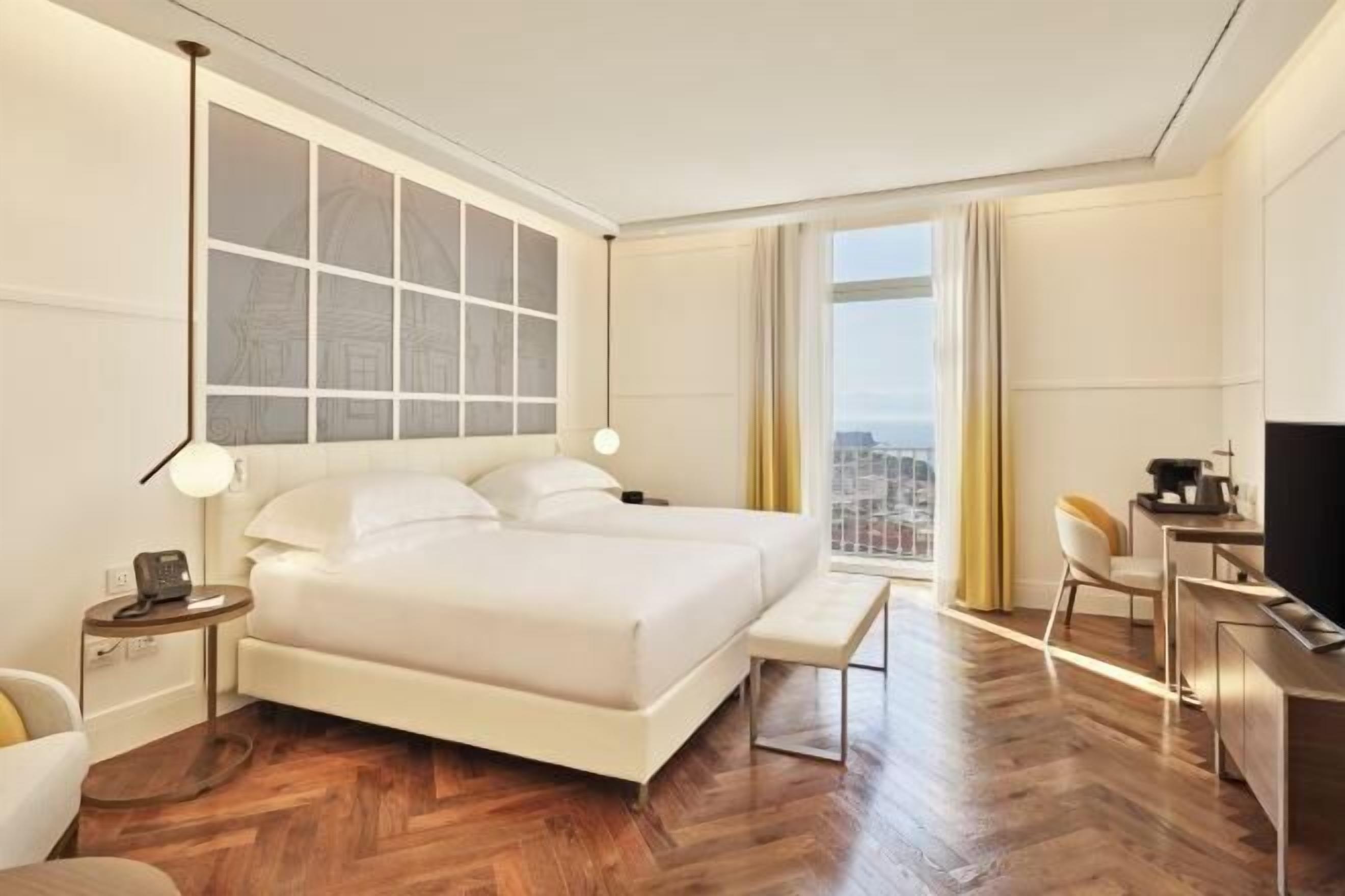 Premium bedding, down comforters, memory foam beds, minibar