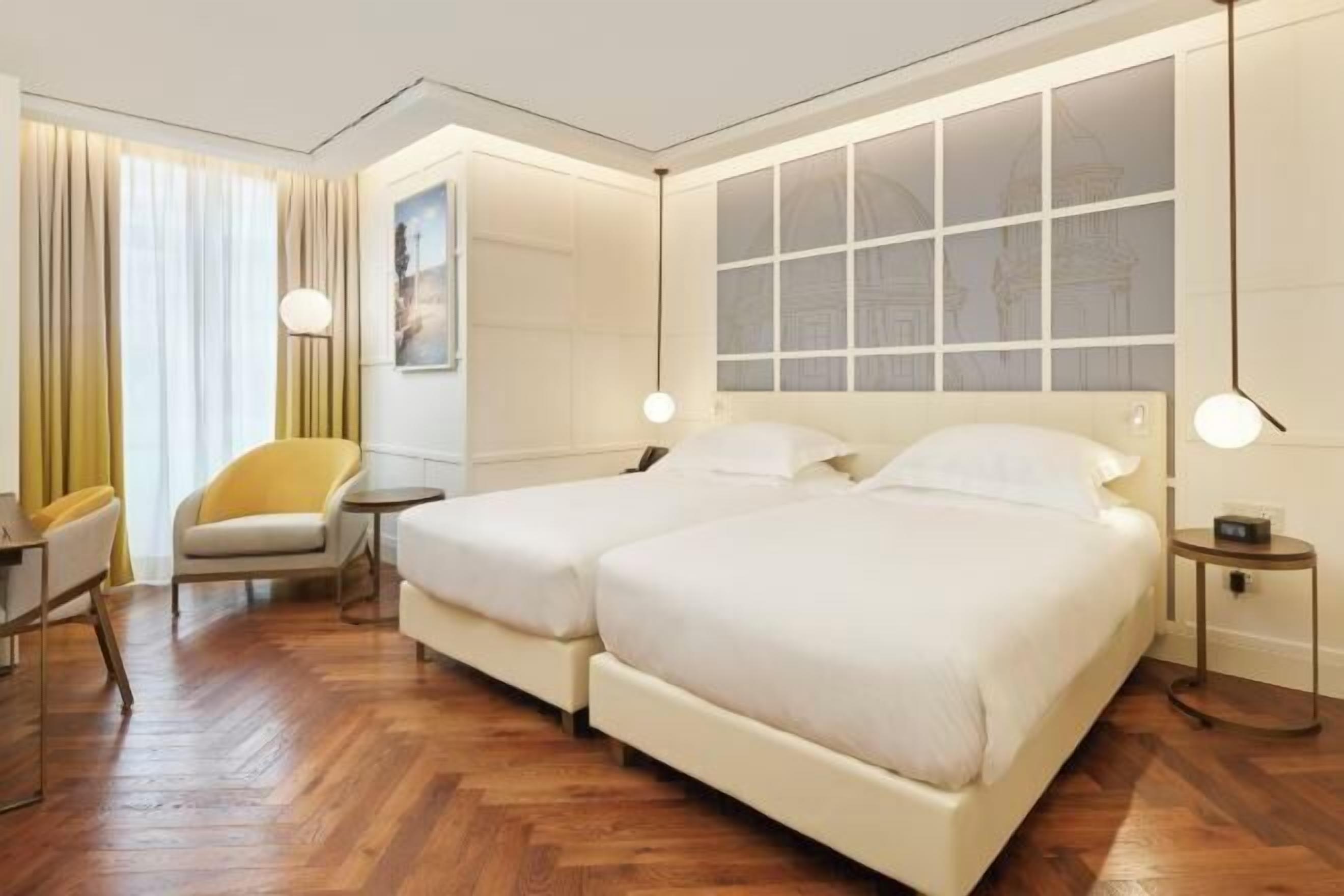 Premium bedding, down comforters, memory foam beds, minibar